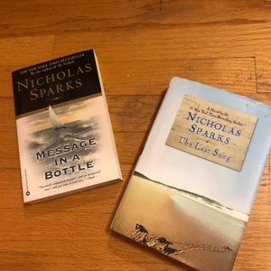 2 Nicholas Sparks books- $4